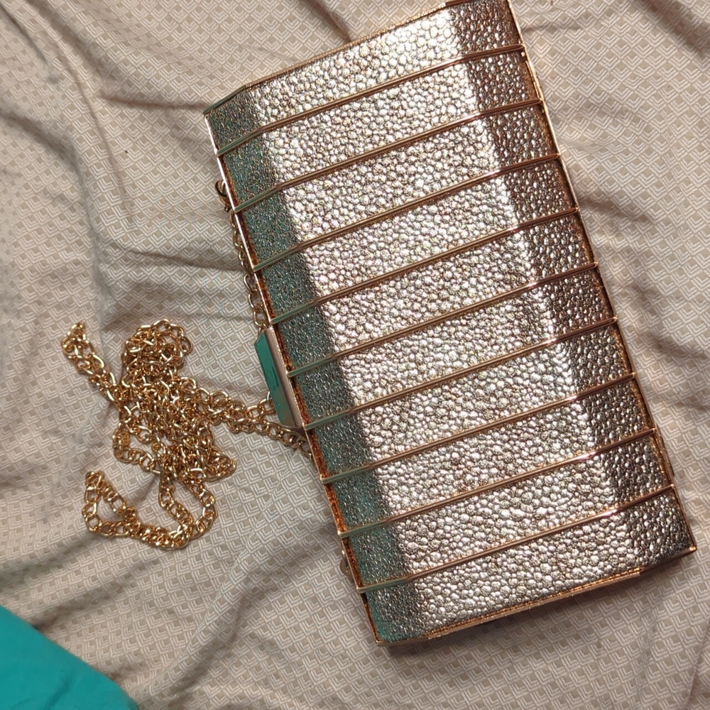 Gold convertible clutch